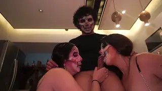 Day of the Dead Threesome With Busty Latina MILFs