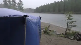 Muscular Europeans Steam Up a Portable Sauna Outdoors