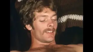 Retro Stud Strips Down in a Grainy Vintage Solo Performance