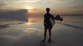 Mature Woman Performs Erotic Dance on Salt Flats