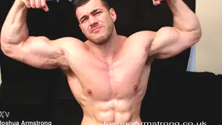 Muscular Hunk Flexes Veiny Pecs for the Camera