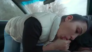 Petite Brunette Delivers a Deep Blowjob in a Moving Car