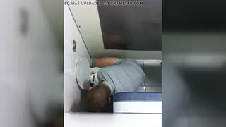 Asian Couple Shares a Blowjob Through a Glory Hole