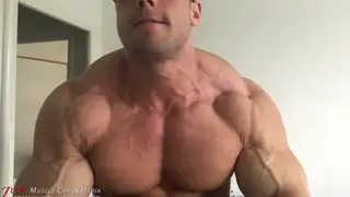 Muscular Hunk Flexes His Powerful Physique
