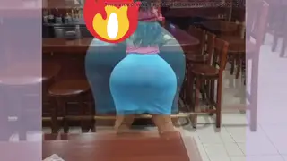 Teen Waitress Teases in a Short Skirt at the Bar