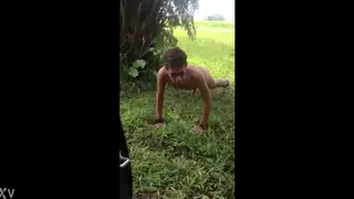 Solo Guy Works Out and Strokes in Public Gym
