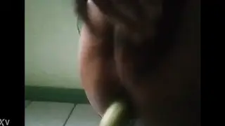 Amateur Stretches Wide With a Cucumber Toy