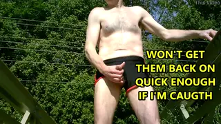 Hairy Mature Man Strokes His Big Cock on a Park Bridge