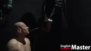 European Dom Pisses On Sub After Head Shave