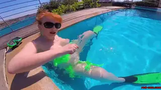 Voluptuous Redhead Enjoys Solo Poolside Pleasure
