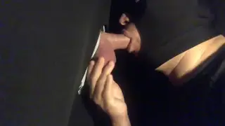 Stranger Drains Cock Through Gloryhole Until He Swallows
