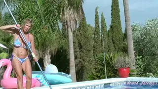 Blonde MILF Serves a POV Blowjob by the Pool