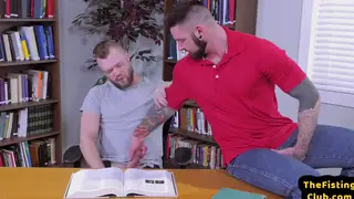 Tattooed Bottom Takes Fist in Public Library