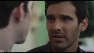 Two Men Share a Tender Kiss in Romantic Moment