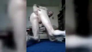 Solo Performer Glides Through Oiled Cosplay Tease