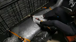 Dominant Woman Teases With Sock-Covered Feet