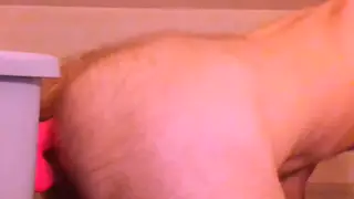 Hairy Guy Takes Oiled Toy Deep in Doggystyle