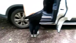 British Teen Swallows in a Public Car Park