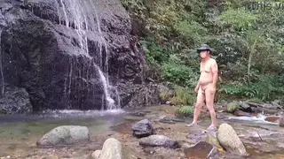 Nude Swimmer Surprised by Two Uniformed Women Watching From Above