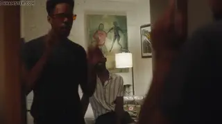 Two Muscular Black Men Kiss and Grope in Passionate Embrace