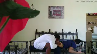 Doctor Fills Young Patient on the Exam Table