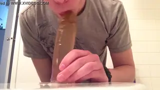 Blonde Stud Gags on Massive Dildo in Solo Deepthroat