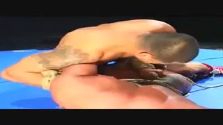 Muscular Wrestlers Tangle in Ropes and Tights at Gym