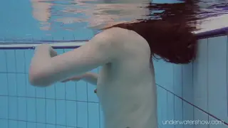 Czech Redhead Strips to Lingerie for Poolside Tease
