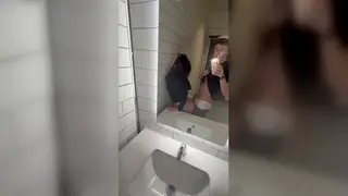 Petite Brunette Pays for a Fender Bender in a Parking-Lot Bathroom