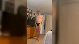 Mature Muscle Model Strips Thong to Show Uncut Cock