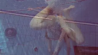 European Babe Teases Underwater in a Pool