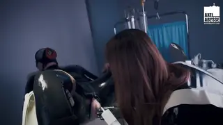 Muscular Tattooed Man Takes Deep Anal Fisting on Exam Chair