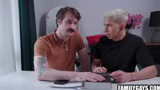 Muscular Stepdad Guides His Stepson Through a First Blowjob
