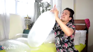 Amateur Inflates Dozens of Condoms Until They Burst