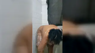 Voluptuous Ebony MILF Gets Dirty Under the Spray