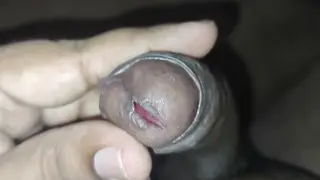 Woman Explores Foreskin Bondage in Solo Session