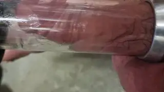 Hairy Bear Edges Uncut Cock with Milking Machine