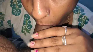 Indian Bhabhi Takes a Deep Blowjob to a Mouthful Finish