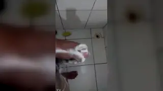 Guy Finishes Hard on the Bathroom Floor