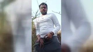 Indian Hunk Strokes and Pisses Beside a Parked Car