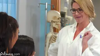 Busty Doctor Joins Two Petite Patients for Lesbian Threesome