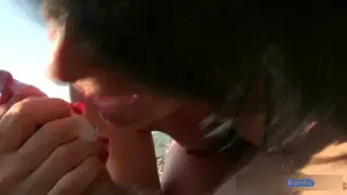 European Milf Handles a Stranger on the Beach