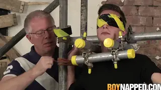 Blindfolded Sub Takes Rough Handjob from Older Dom