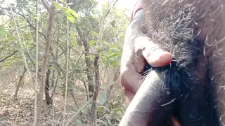 Hairy Hunk Strokes His Uncut Cock Outdoors