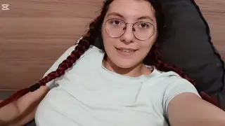 Redhead Teases Viewer With Handjob Instructions