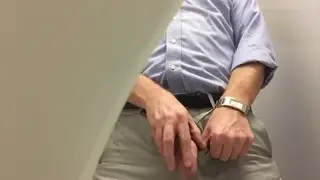 Mature Daddy Strokes His Big Cock While Pissing