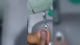 Latino Unloads in Bathroom Mirror Over Sink