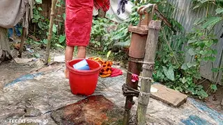 Indian Housewife Bathes Nude in an Open Field
