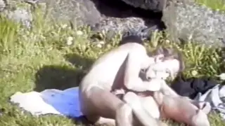 Mature Daddy Receives Blowjob on Public Beach