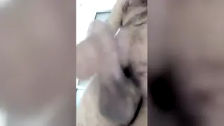 Man Touches Himself Slowly in a Quiet Room